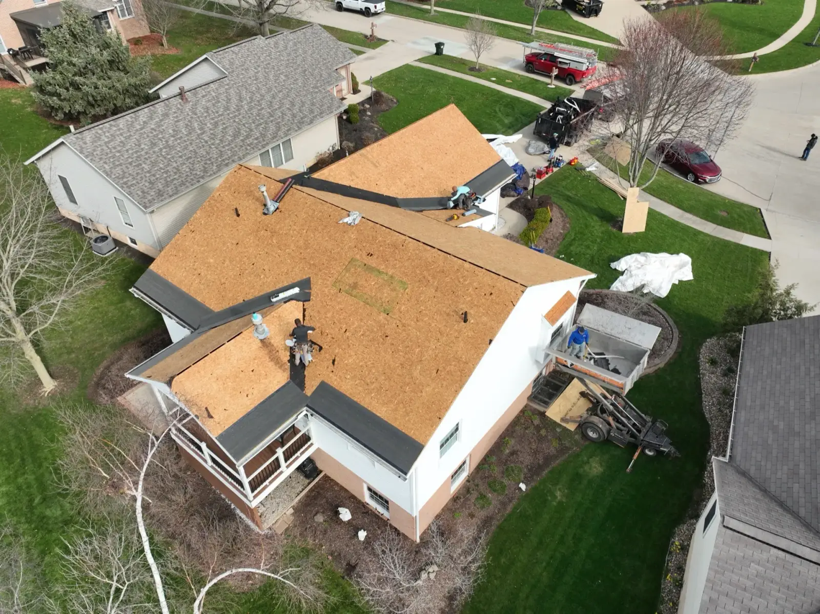 Roof tear-off crew at work. Wayne County